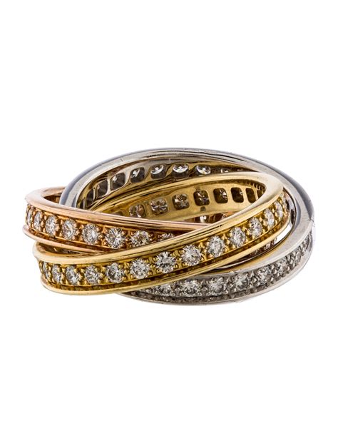 cartier trinity rolling ring.